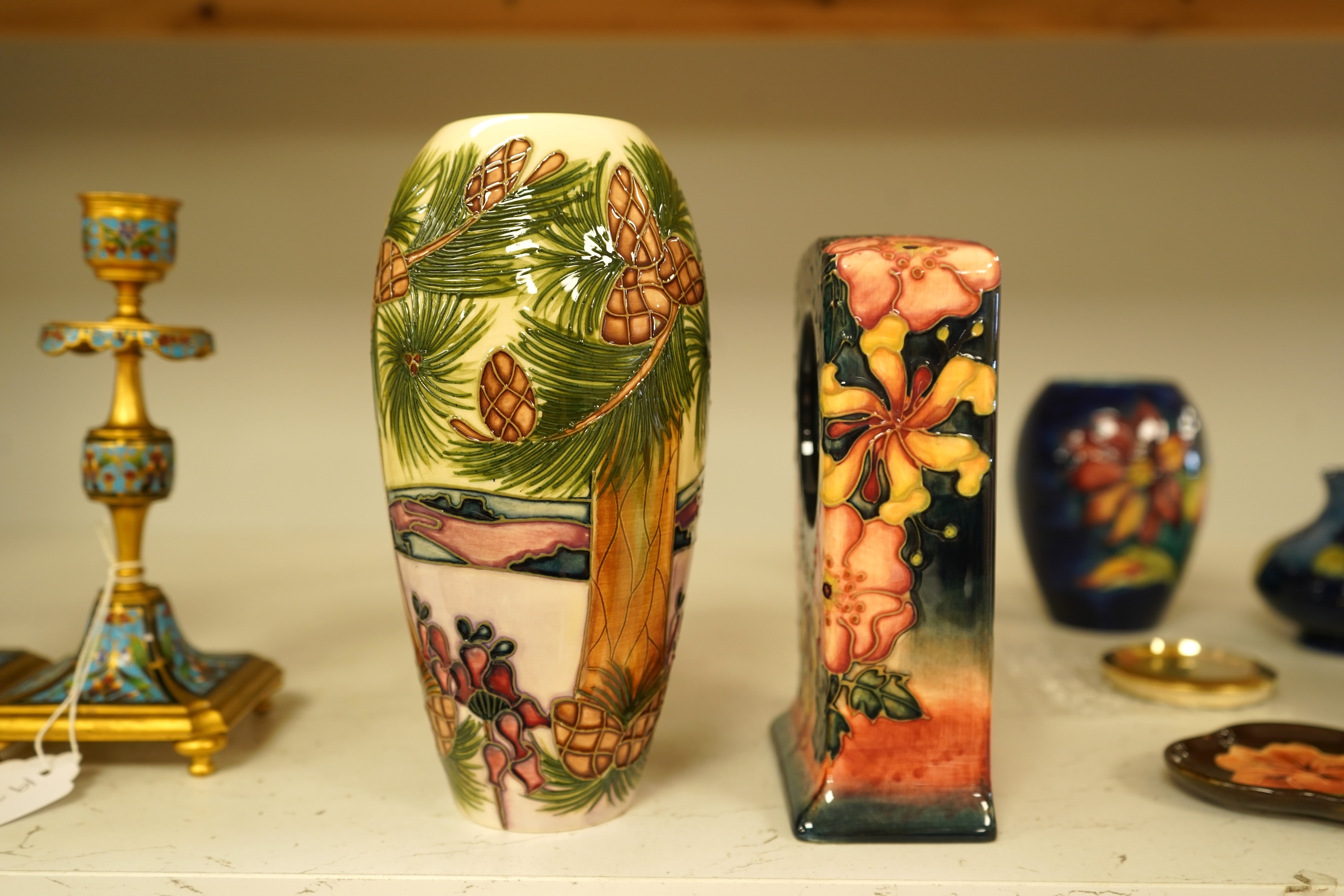 A collection of nine modern Moorcroft pieces including a Furzy Hill vase and a Toadstool vase, tallest 19cm